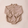 Beige baby romper with long sleeves 